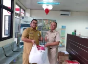 Meriahkan HUT RI, Kecamatan Sukmajaya Bagikan Ratusan Bendera Merah Putih kepada Warga